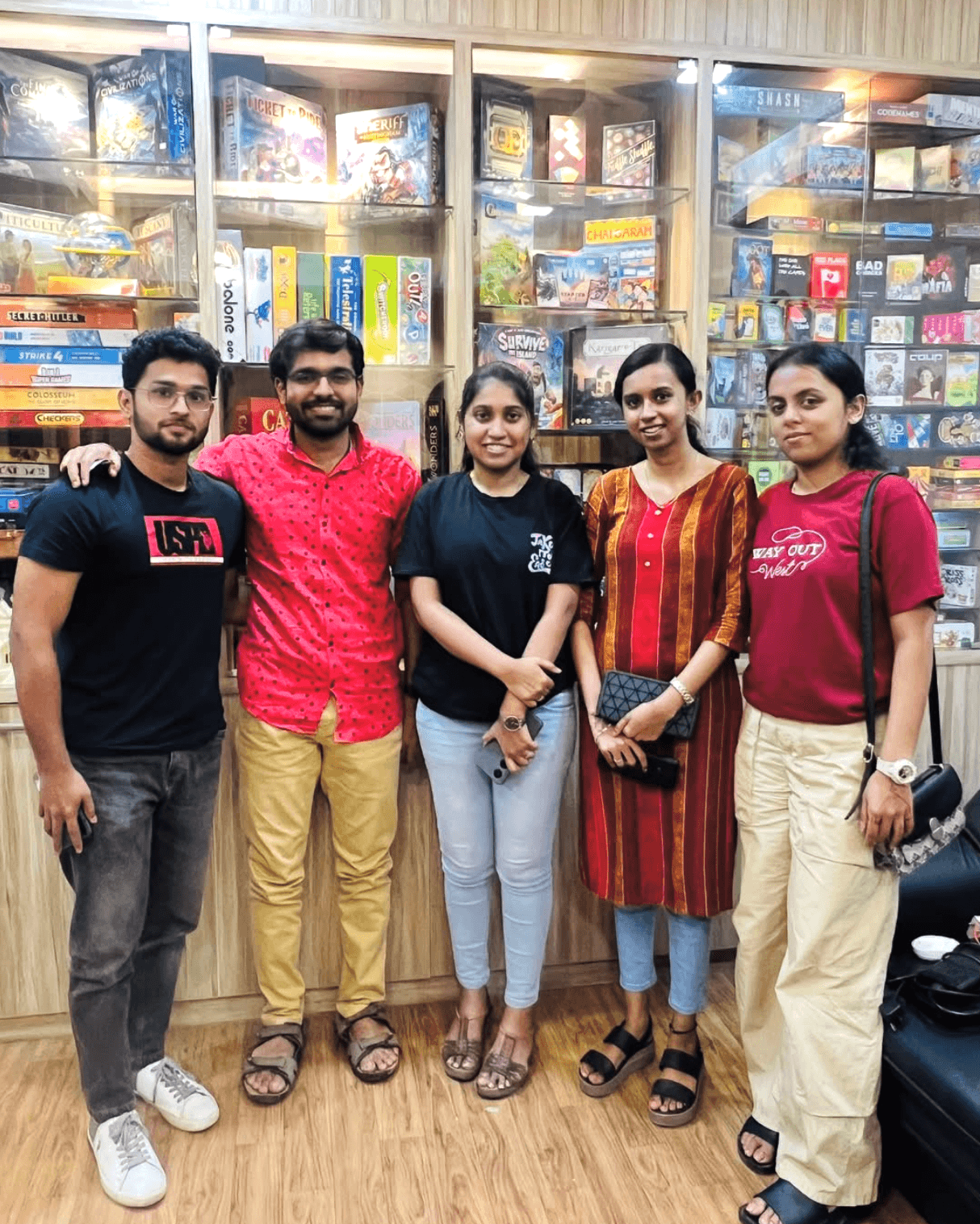 Friends playing board games at a cozy table